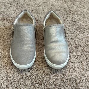 Gold slip on sneakers